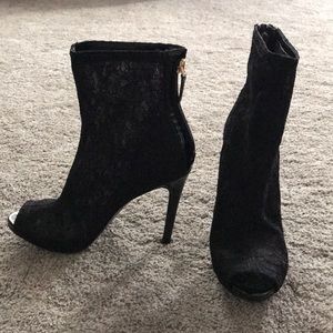 Black open toe calf bootie never worn